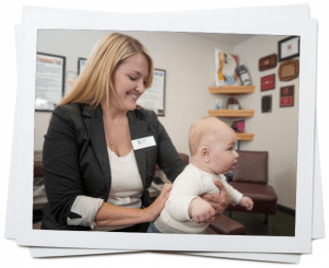 blog picture of chiropractor checking baby's back